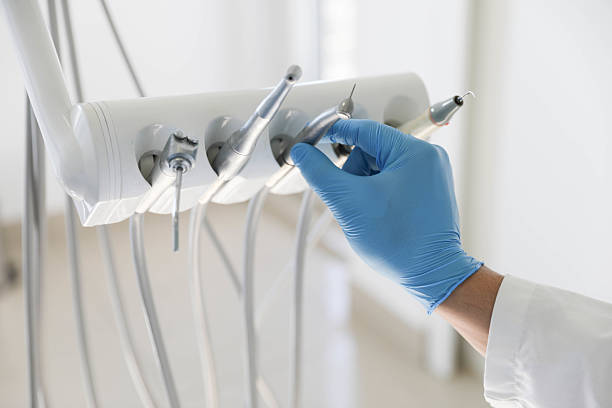 Professional Tooth Extraction technician working in Clayton, NM